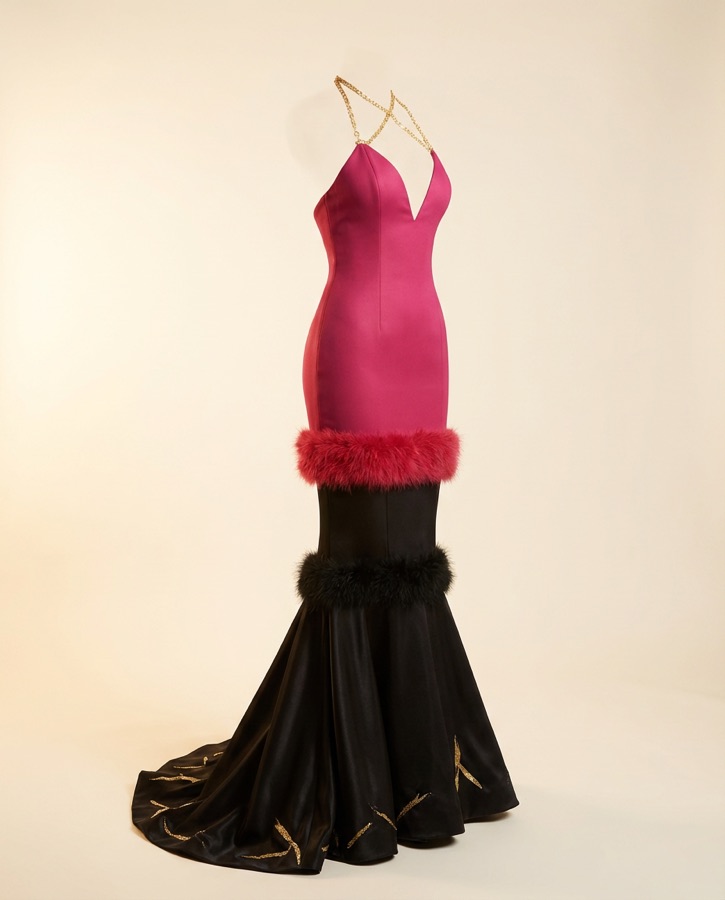 Caliente by Oscar B — red gown with feather hem