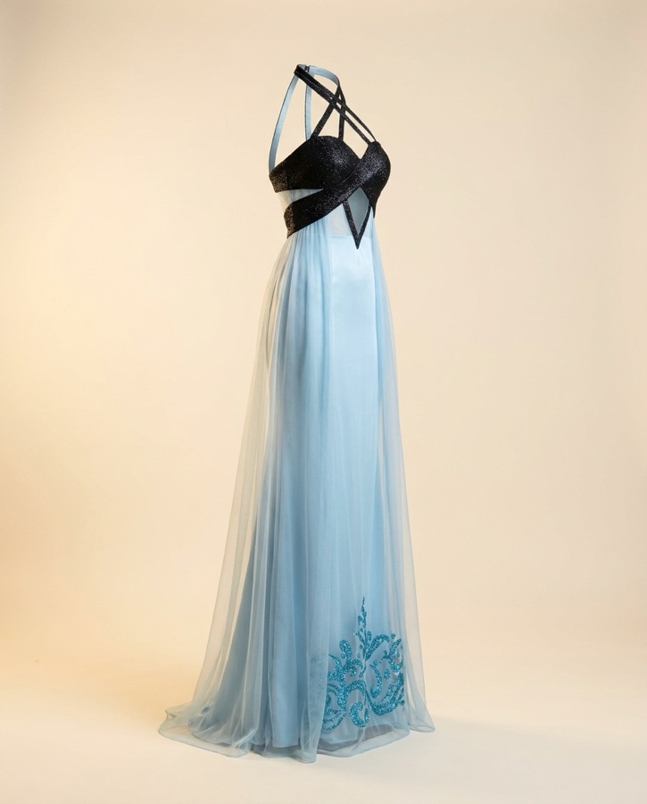 Caliente by Oscar B — teal bustier with translucent embroidered train